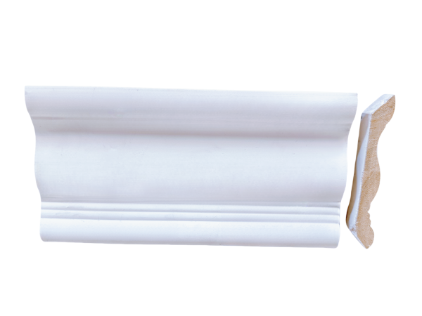 White painted wood crown molding with curved concave profile and exposed wood end