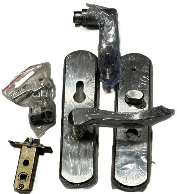 Metal fence hardware kit including brackets, latches, hinges, and mounting components wrapped in plastic