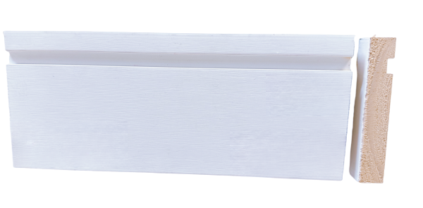 White painted baseboard trim with rounded top edge and exposed wood backing