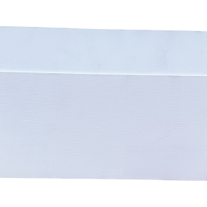 White painted baseboard with decorative wavy edge pattern and wood core
