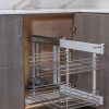 Kitchen corner cabinet with three-tier pull-out wire basket organizer system extended open showing chrome shelving and storage capacity