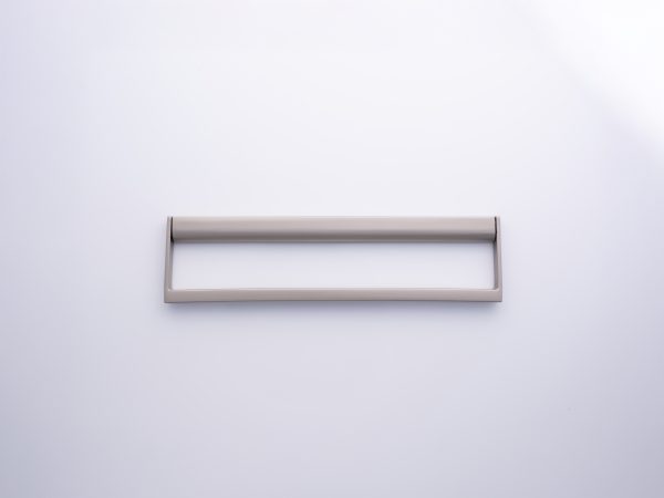 Brushed nickel rectangular cabinet handle with minimalist frame design on white background