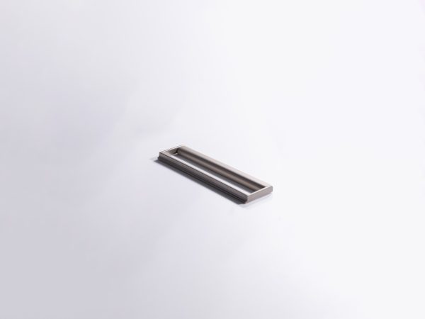 Stainless steel rectangular cup pull handle with angled perspective on white background