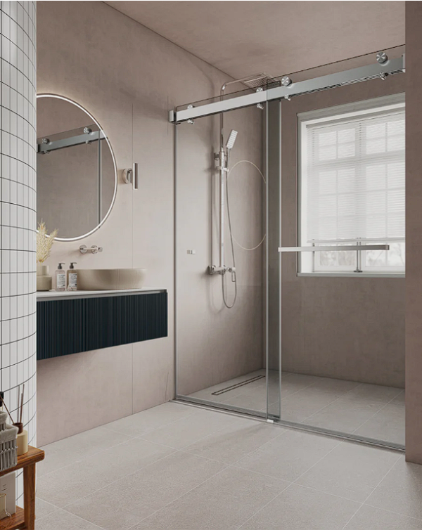Modern bathroom interior with beige walls, white subway tile accent, sliding glass shower enclosure, round mirror, black vanity cabinet, and window with blinds