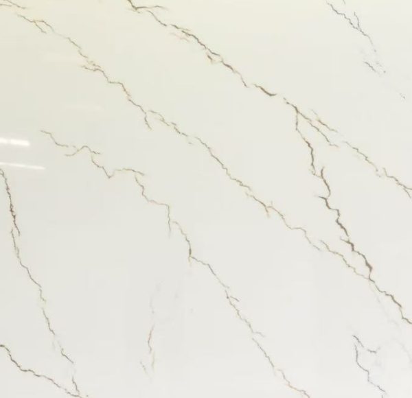 White marble surface with diagonal golden and taupe veining pattern