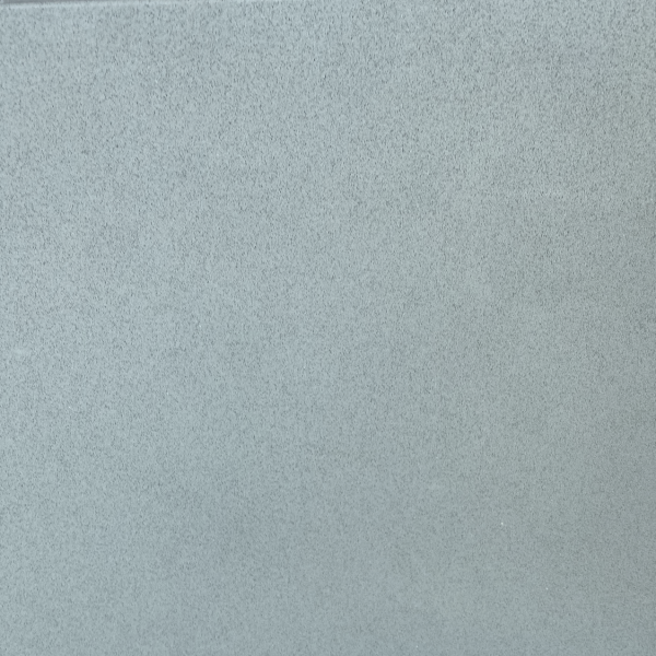 Soft gray-blue textured fabric or felt surface with uniform matte finish