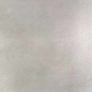 Smooth light beige or cream colored stone surface with minimal texture and soft gradient lighting