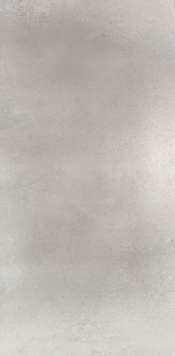 Smooth light beige or cream colored stone surface with minimal texture and soft gradient lighting