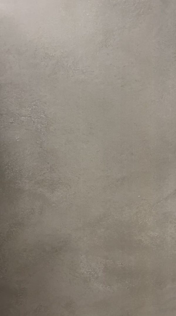 Concrete or cement surface with neutral gray-beige tone and light texture