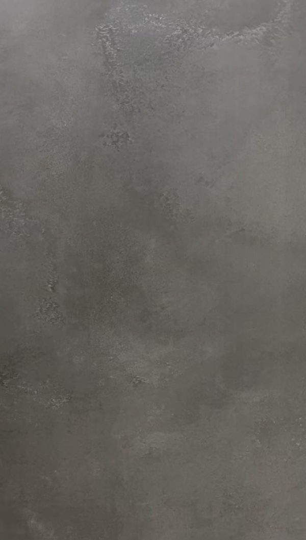 Concrete floor with gray finish and slight surface variations