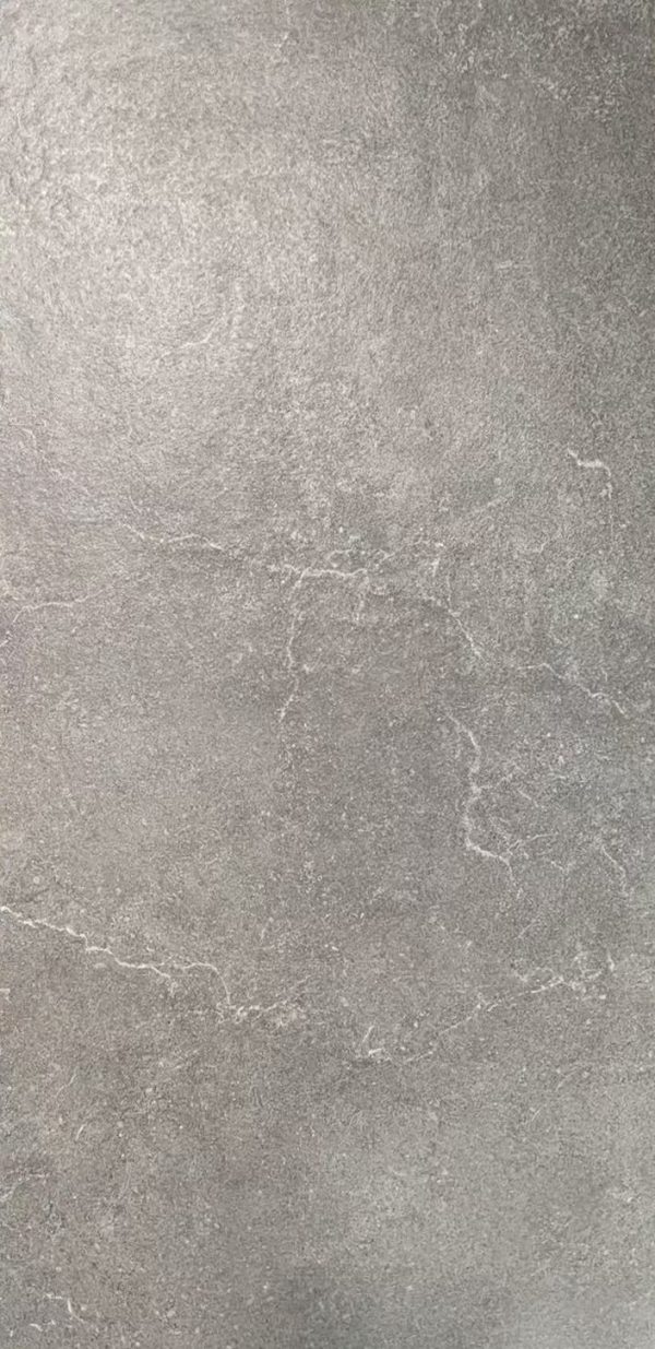 Close-up of gray stone surface with subtle white veining pattern