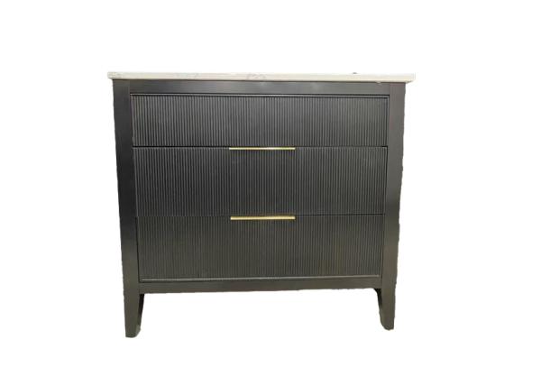 Dark gray bathroom vanity with vertical fluted front panels and three drawers, contemporary style