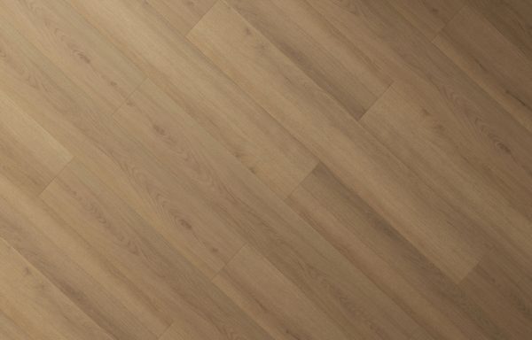 Medium tan wood-look laminate flooring with herringbone plank pattern