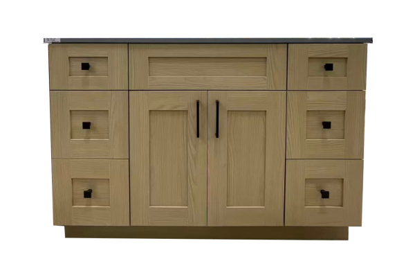 Natural oak wood vanity with dark countertop, six drawers on sides, and two center cabinet doors with black handles