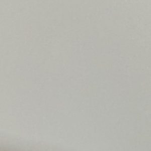 Solid light gray-beige colored surface with uniform finish