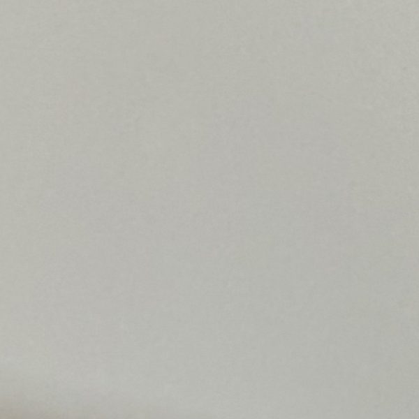 Solid light gray-beige colored surface with uniform finish